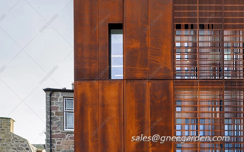Rusted corten steel panels cladding facade Rusted corten steel panels cladding facade