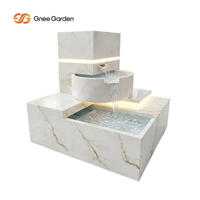 Fontana a cascata in acciaio bianco con illuminazione a LED